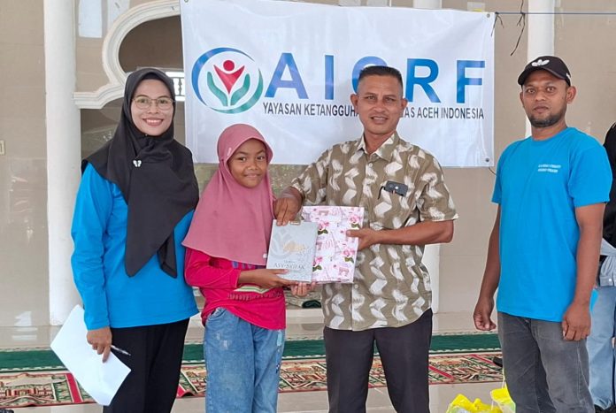 Jelang Lebaran, Anak Penyintas Bencana di Pidie Jaya Terima Paket Ibadah dan Sembako dari AICRF